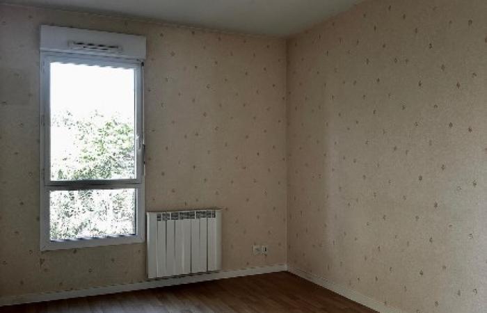 Appartement à Vannes avec une terrasse, un garage et d'une place de parking.